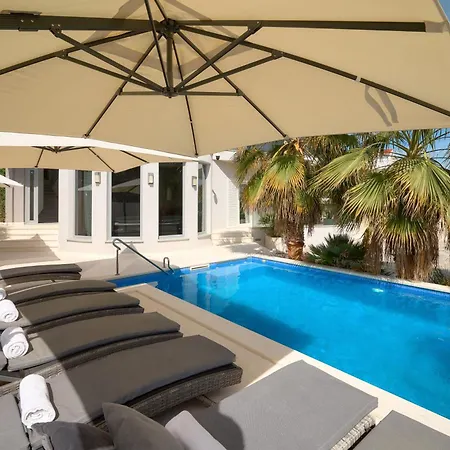 Beachfront Sevid With Heated Pool And Jacuzzi Villa